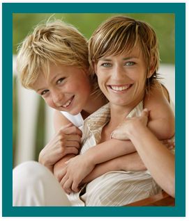 photo of woman and boy smiling