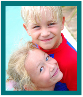 photo of boy and girl smiling